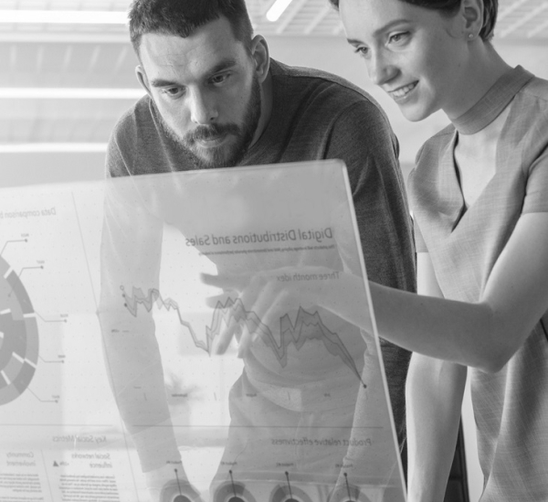 Woman and man analyzing data