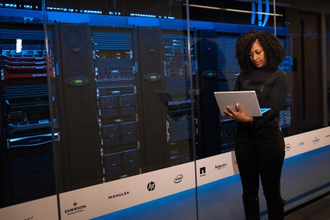 a woman working with data